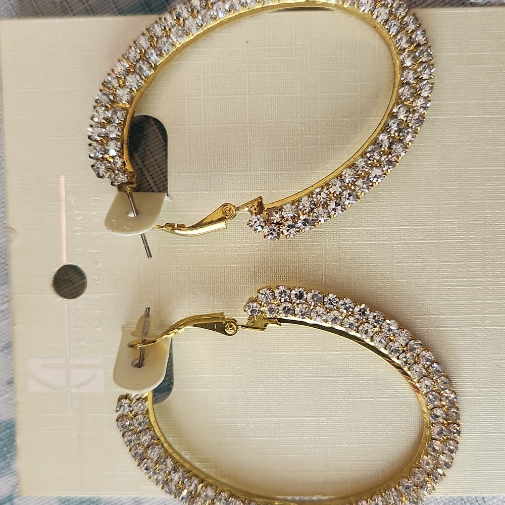 2 1/4 Inch long Rhinestone Hoops. Rhinestones are on the outside of the hoop!